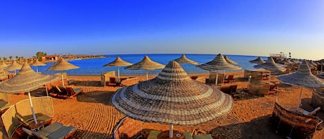 Private beach, sun loungers, beach umbrellas, beach towels