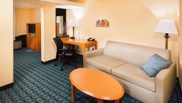 Premium bedding, desk, laptop workspace, iron/ironing board