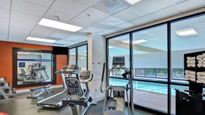 A gym with treadmills, elliptical machines, and a rowing machine. - Hampton Inn Lewisburg (Lewisburg)