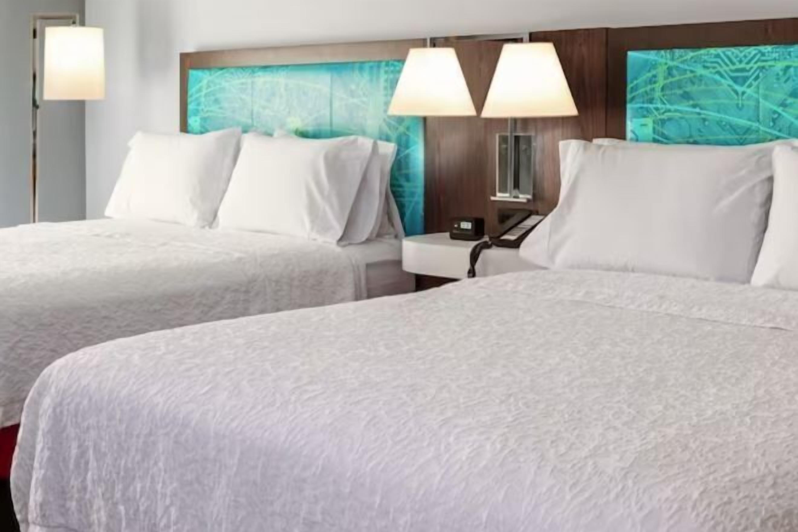 Desk, laptop workspace, iron/ironing board, free cots/infant beds