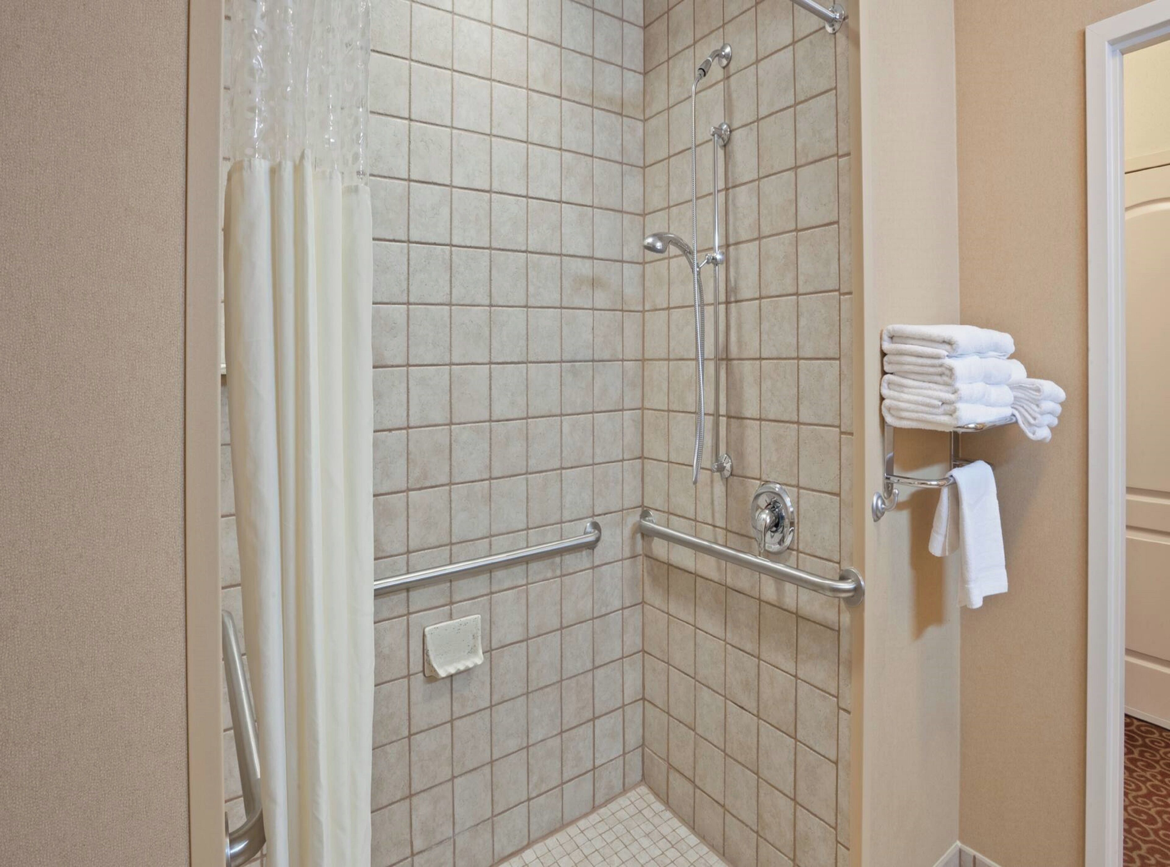 shower, free toiletries, hair dryer, towels