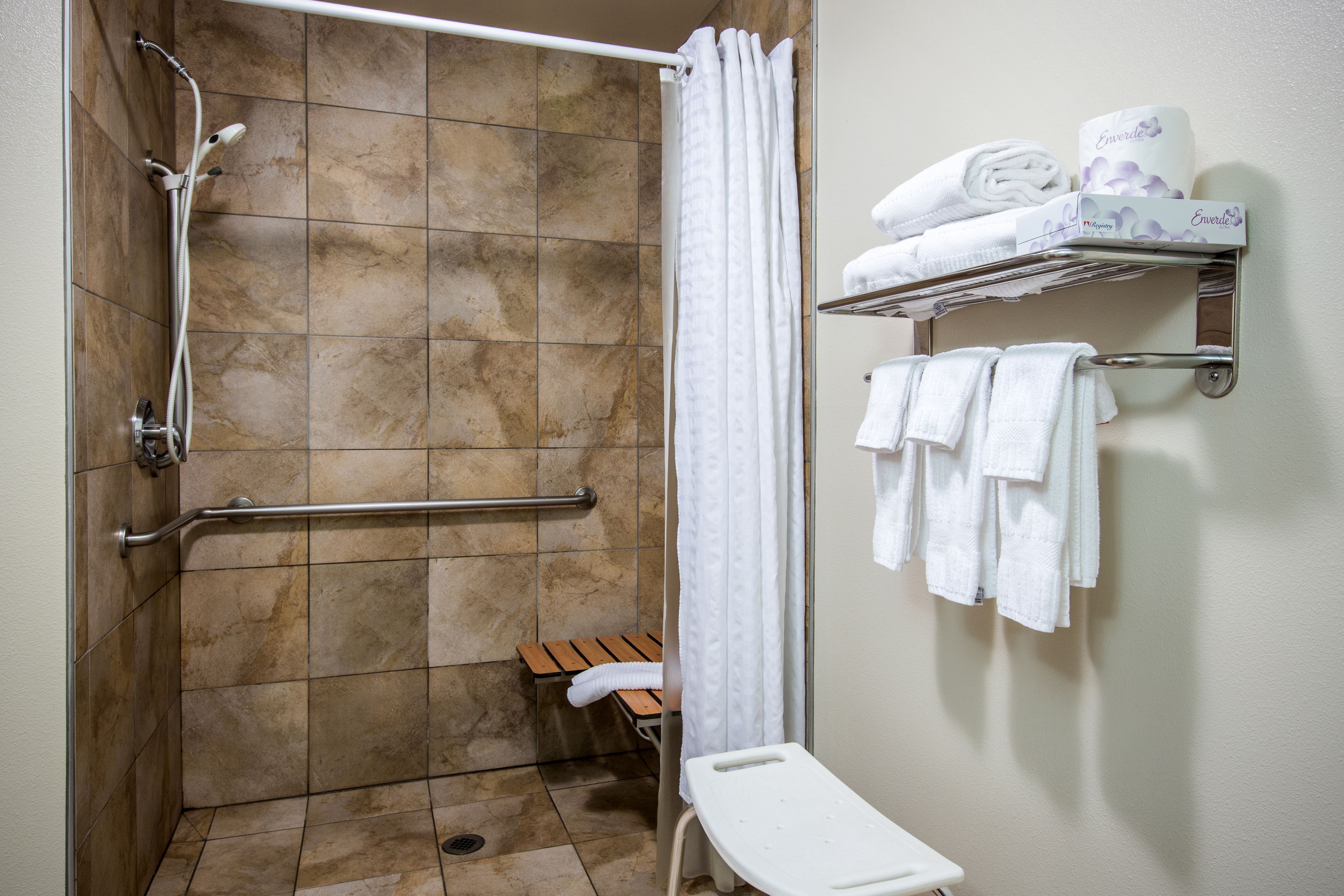 studio suite, 1 queen bed, accessible (hearing, roll-in shower) | bathroom | shower, hair dryer, towels