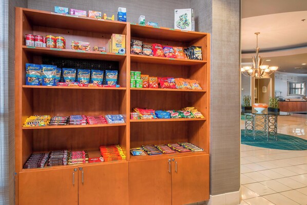A snack display with various packaged foods.