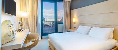 Hypo-allergenic bedding, down duvets, minibar, in-room safe