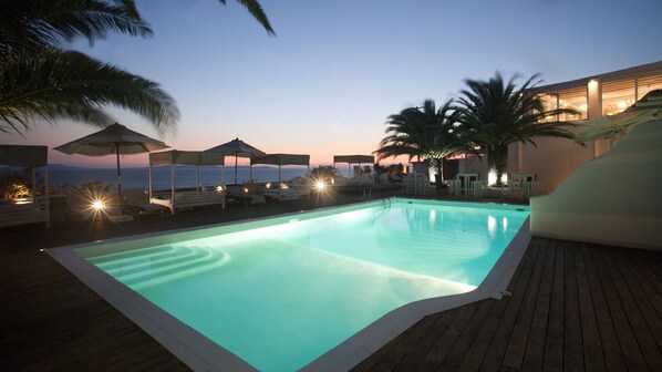 Outdoor pool, pool umbrellas, pool loungers