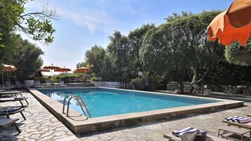 Comfort Room | Pool | Outdoor pool, pool umbrellas, sun loungers