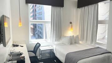 Camas con pillow-top, caja de seguridad en la habitación y escritorio