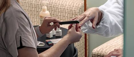 A person getting a manicure.