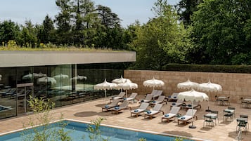 Indoor pool, outdoor pool, pool umbrellas, sun loungers