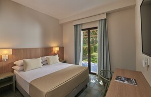 In-room safe, desk, laptop workspace, bed sheets