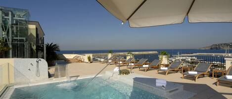 Seasonal outdoor pool, pool loungers