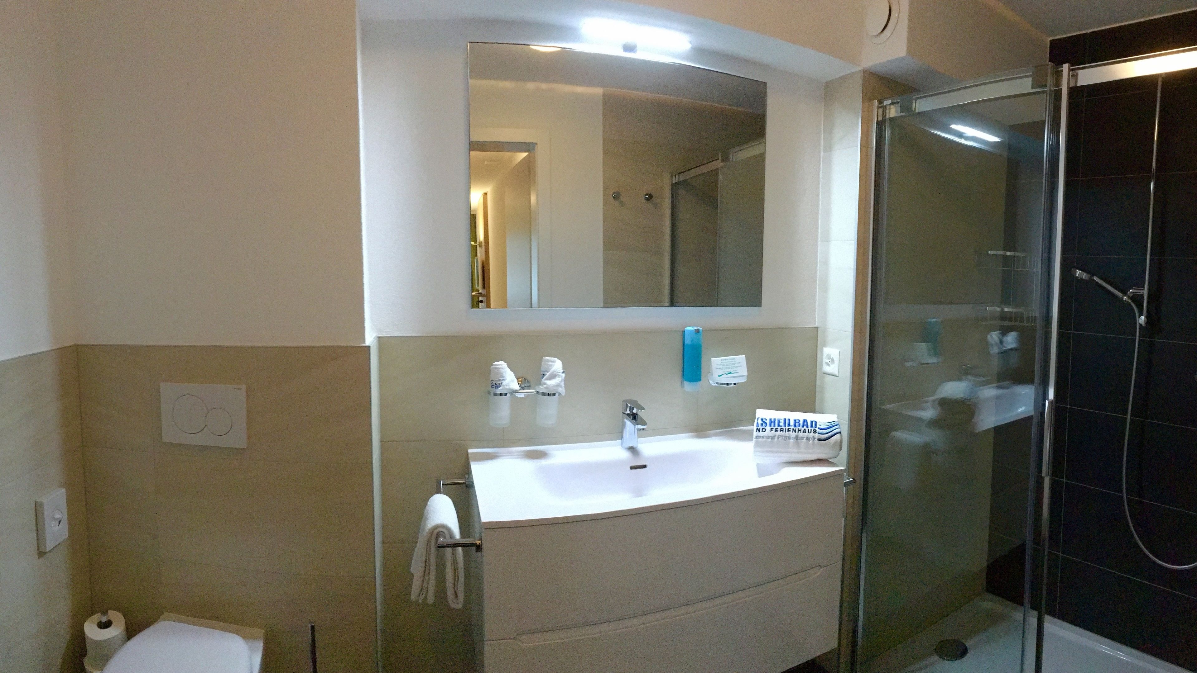 shower, hair dryer, bathrobes, towels