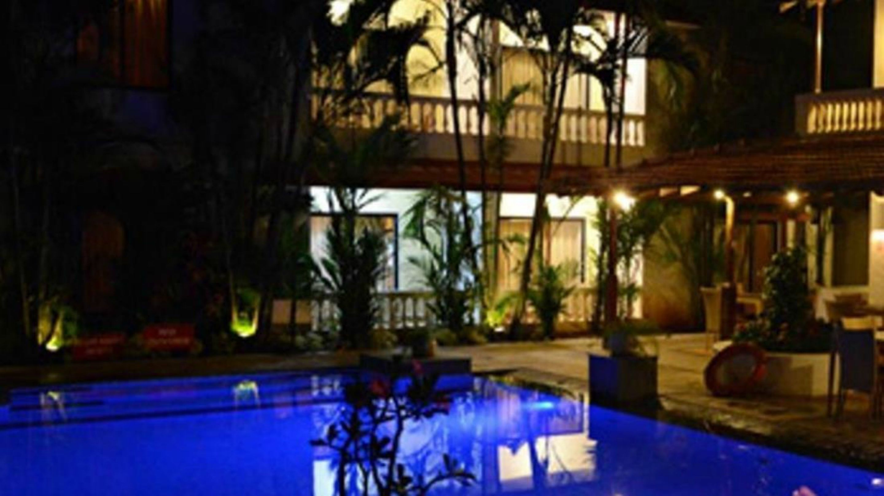 Outdoor pool, open 10:00 AM to 8:00 PM, pool umbrellas, pool loungers