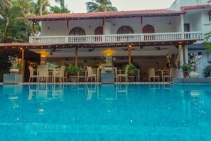 Outdoor pool, open 10:00 AM to 8:00 PM, pool umbrellas, sun loungers