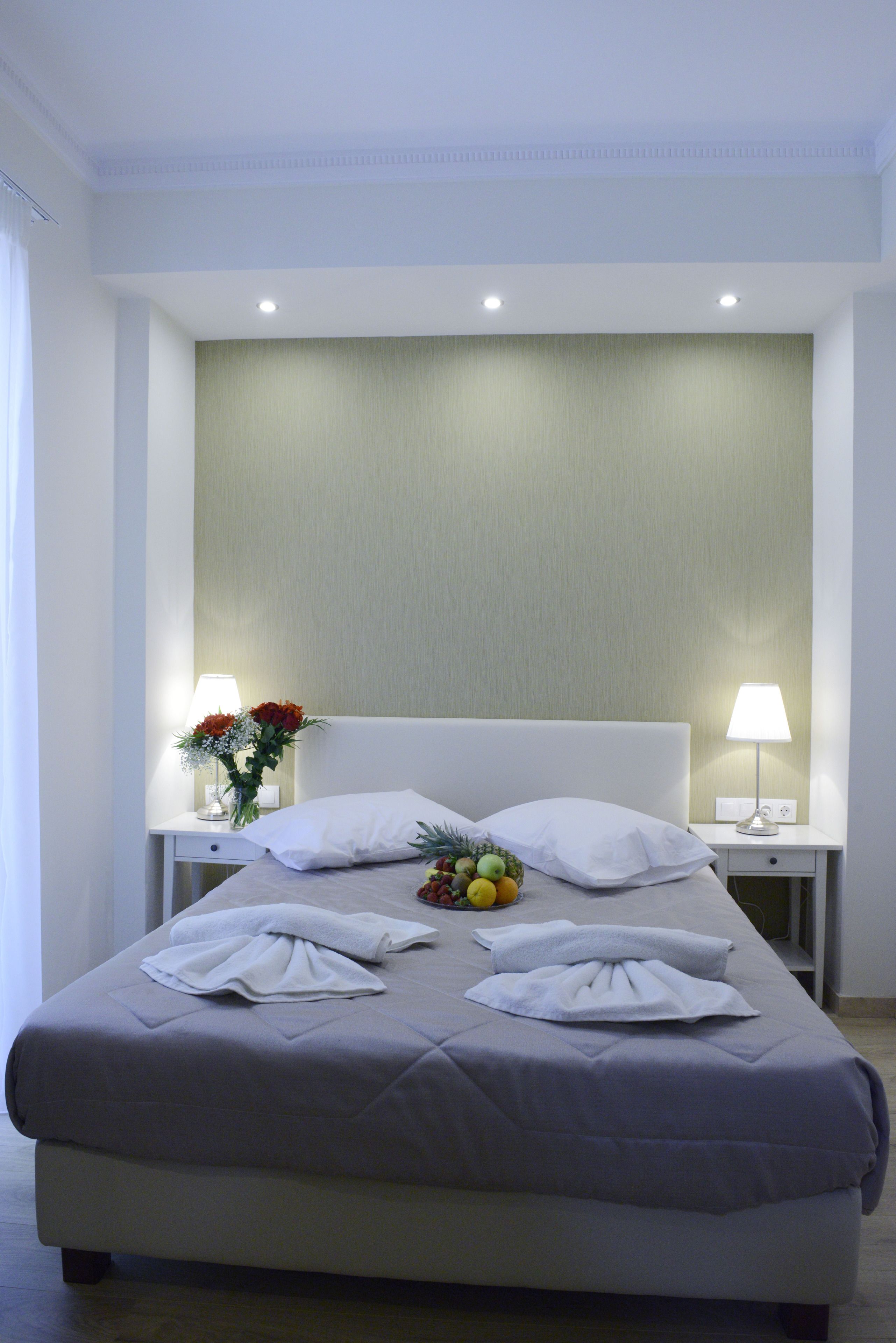 Family Quadruple Room | Down duvets, in-room safe, desk, laptop workspace