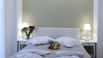 Family Quadruple Room | Down duvets, in-room safe, desk, laptop workspace