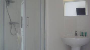 Shower, free toiletries, hair dryer, towels