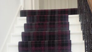A staircase with a checkered carpet. - Scotia Airport Hotel (Paisley)