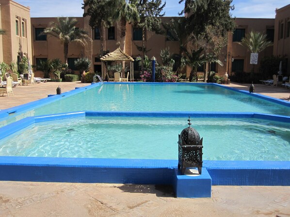 Outdoor pool, pool umbrellas, pool loungers