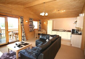 Cabin, Hot Tub | Living room | Flat-screen TV