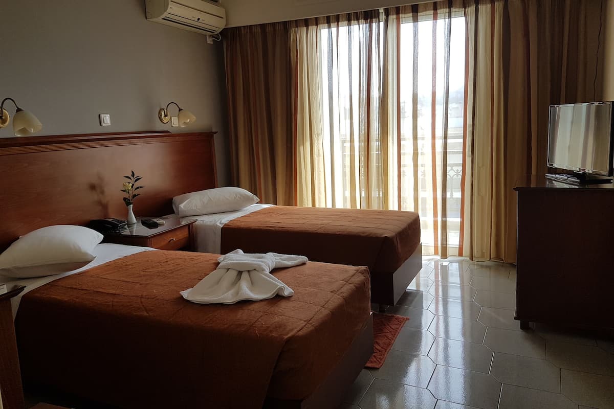 Double or Twin Room | Premium bedding, minibar, in-room safe, desk