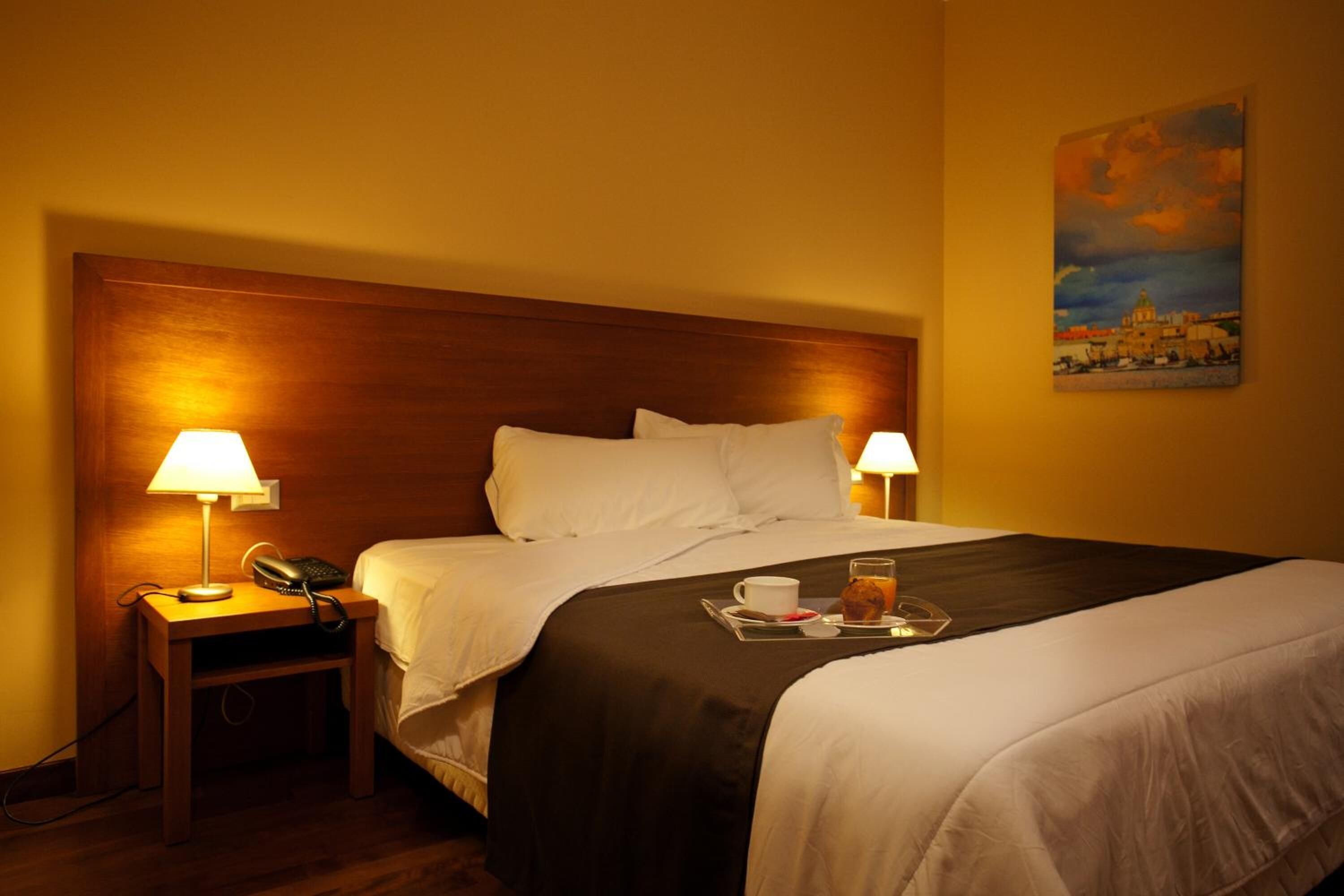 premium bedding, down duvets, minibar, in-room safe