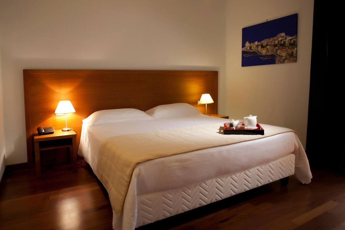 premium bedding, down duvets, minibar, in-room safe