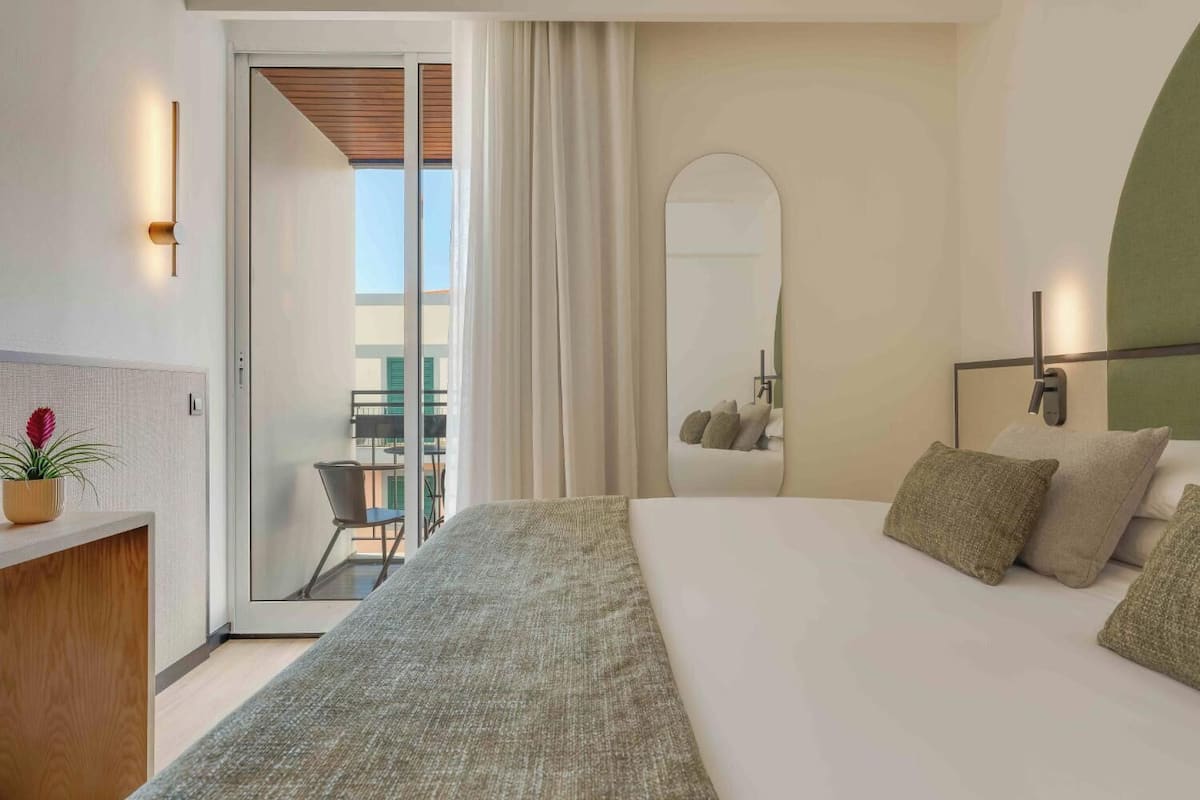 Classic Double Room, Balcony | In-room safe, desk, blackout drapes, cribs (free)