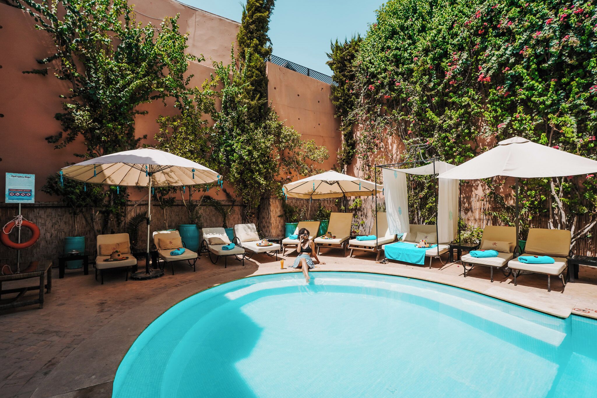 Outdoor pool, pool umbrellas, pool loungers