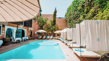 Outdoor pool, pool umbrellas, pool loungers
