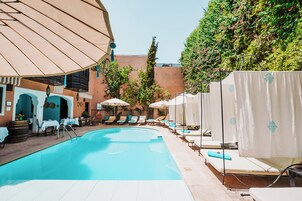 Outdoor pool, pool umbrellas, sun loungers