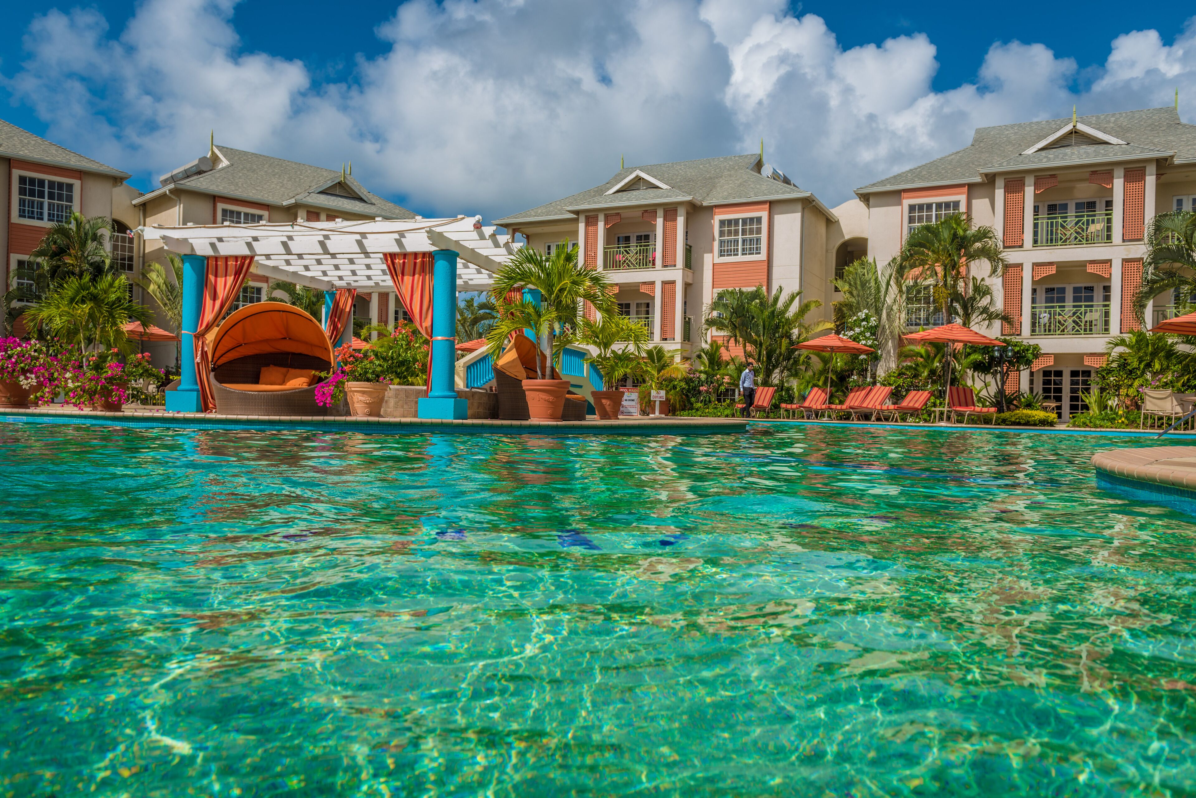 outdoor pool, pool umbrellas, pool loungers