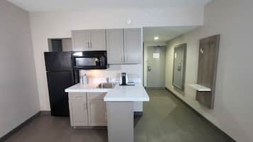Suite, 1 Bedroom | Private kitchen | Mini-fridge, microwave, coffee/tea maker