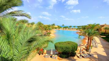 Indoor pool, outdoor pool, pool umbrellas, pool loungers