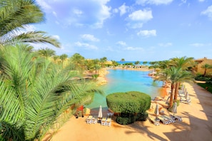 Indoor pool, outdoor pool, pool umbrellas, sun loungers - Stella Di Mare Grand Hotel (Ataqah)