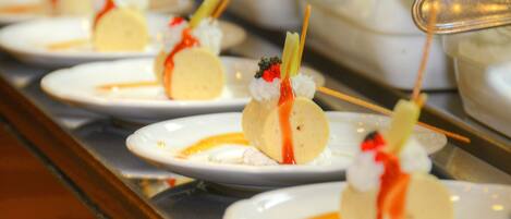 A dessert display with various plated desserts.