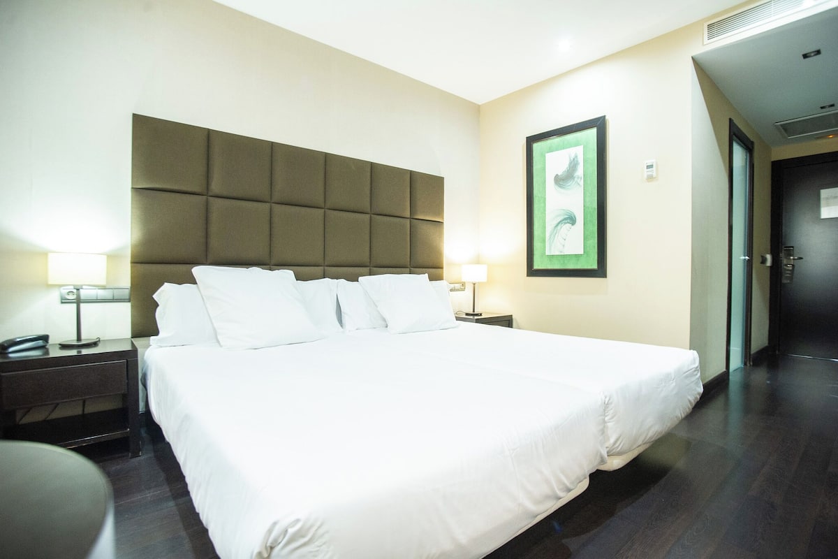 1 habitación, ropa de cama de alta calidad, minibar y escritorio