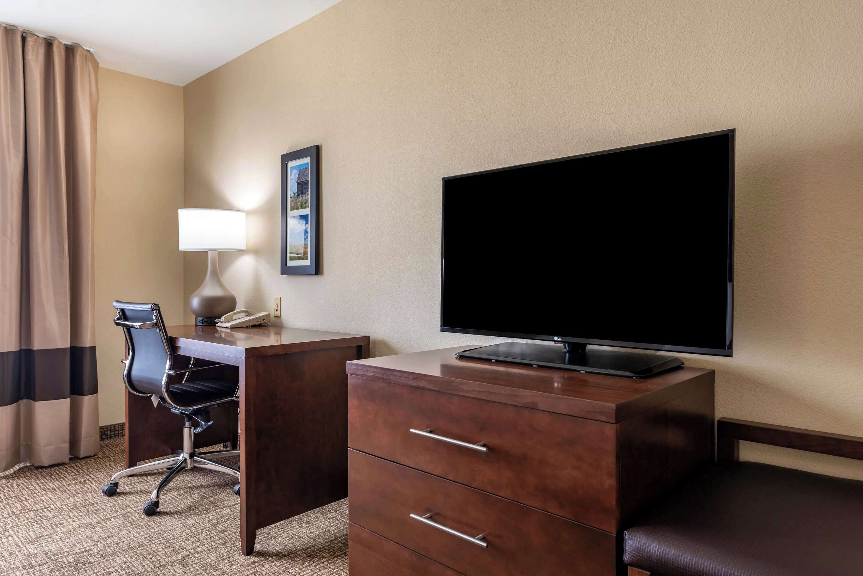 desk, blackout curtains, iron/ironing board, free cots/infant beds