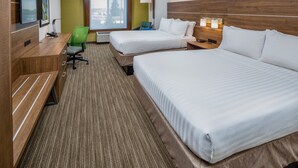 A hotel room with two beds, a desk, a chair, and a large window. - Holiday Inn Express and Suites Modesto by IHG (Modesto)