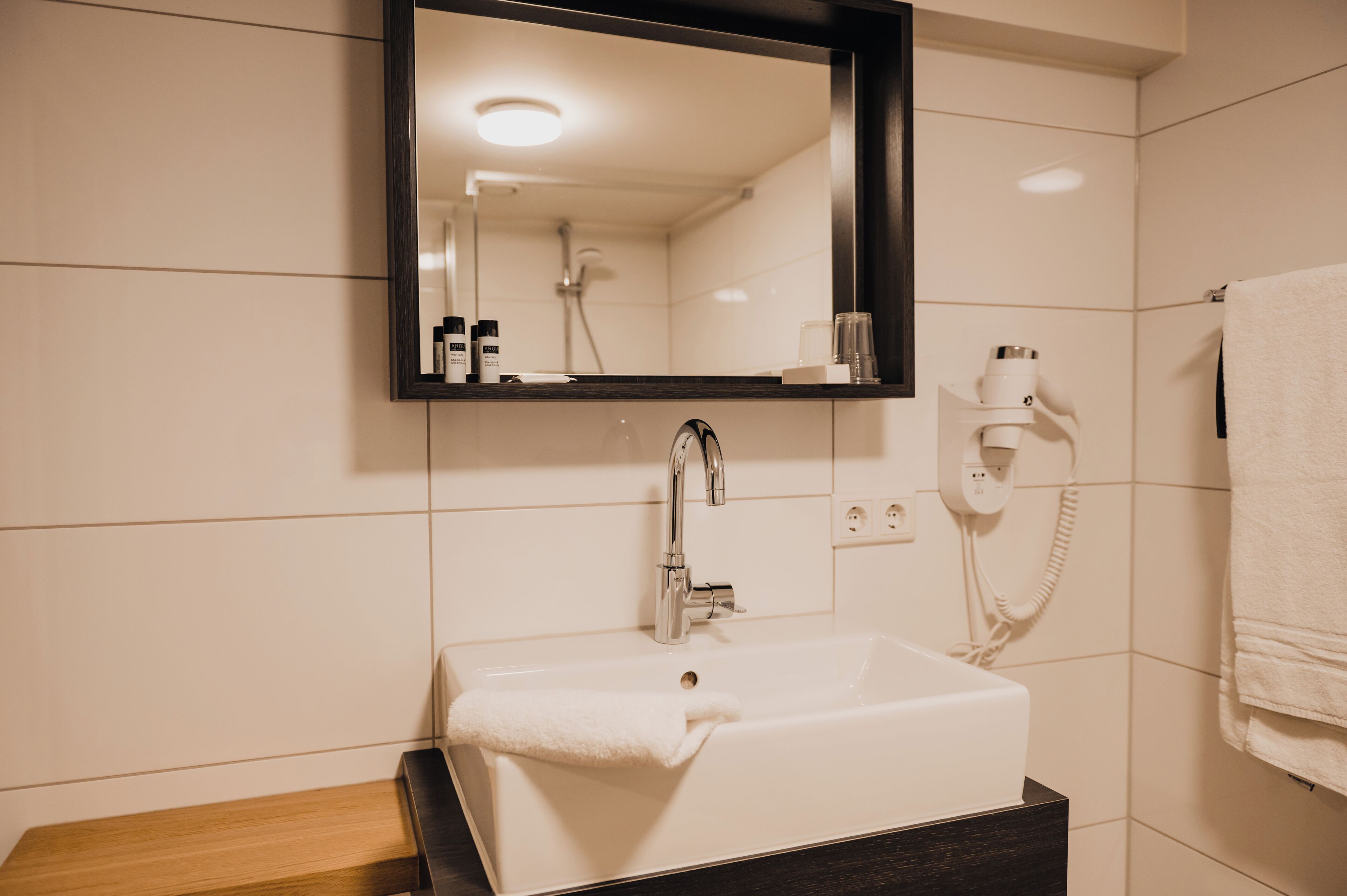 executive twin room | bathroom | shower, rainfall showerhead, hair dryer, towels