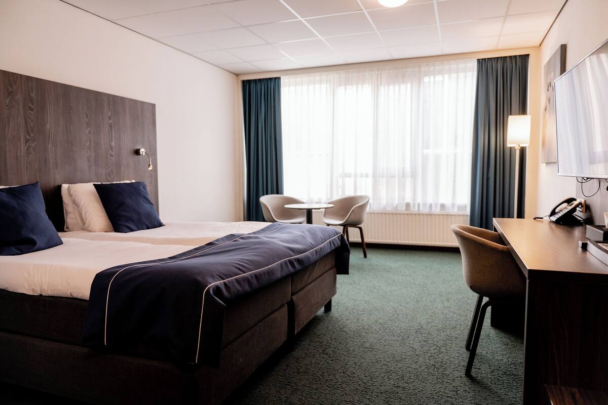 Tomannsrom – comfort | Sengetøy av topp kvalitet, safe på rommet og strykejern/-brett