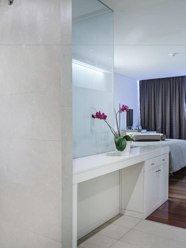 Combined shower/tub, designer toiletries, hair dryer, bathrobes