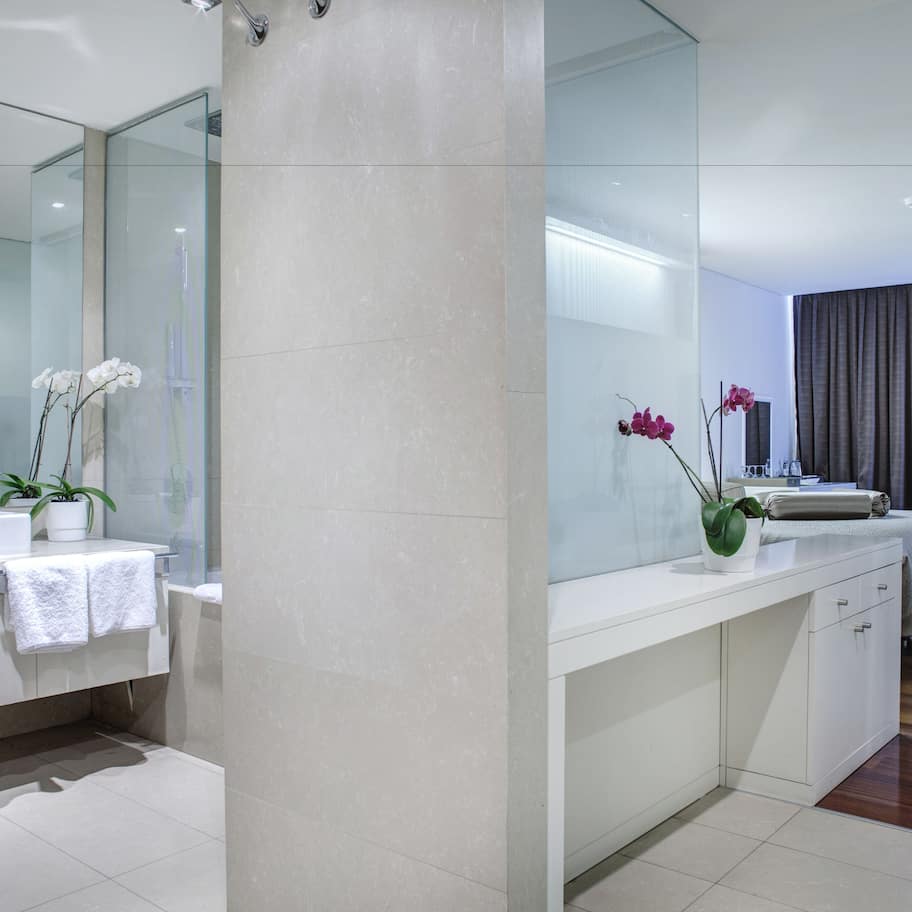Combined shower/bathtub, designer toiletries, hair dryer, bathrobes