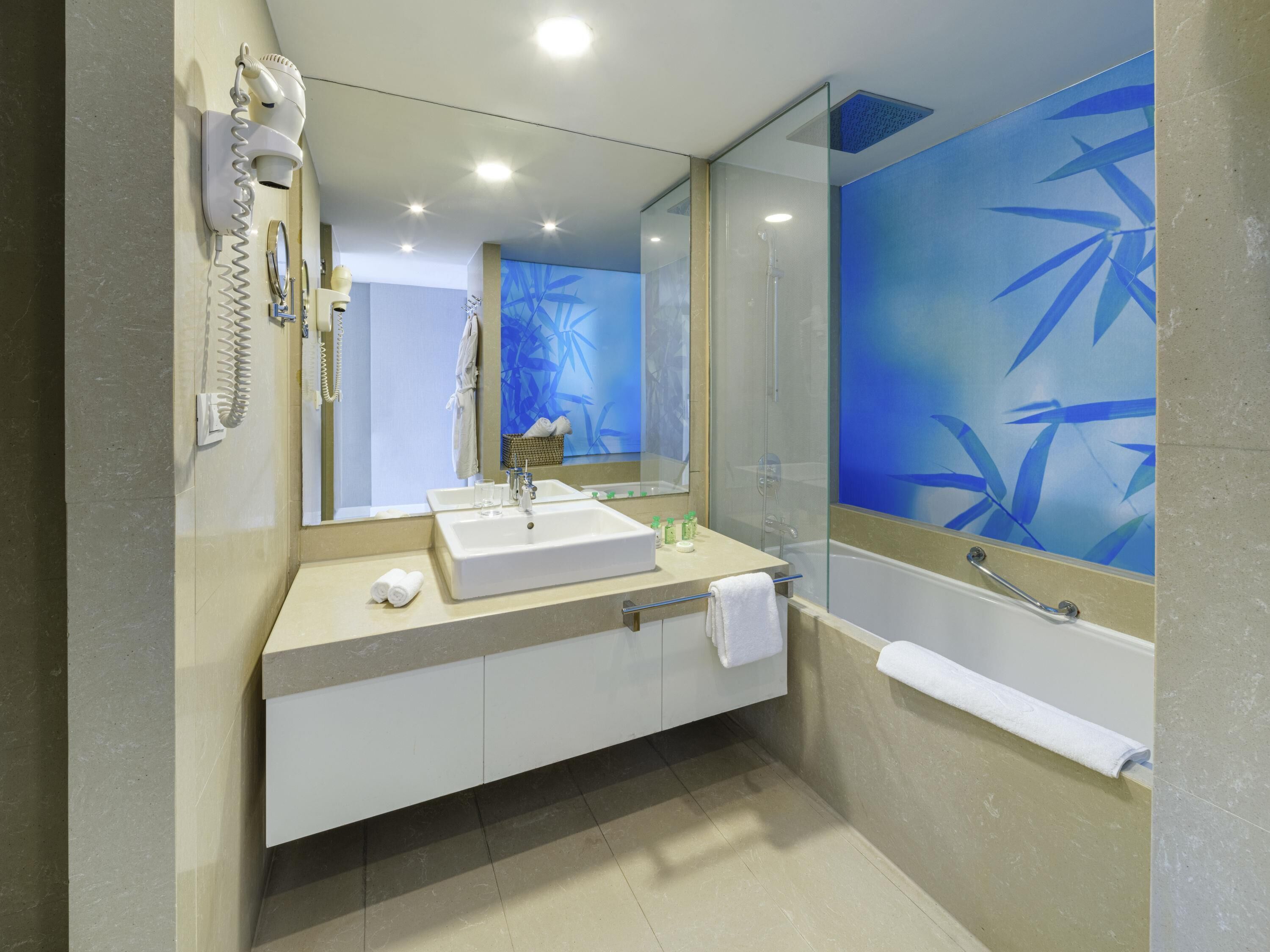 Premium bedding, down comforters, memory foam beds, minibar