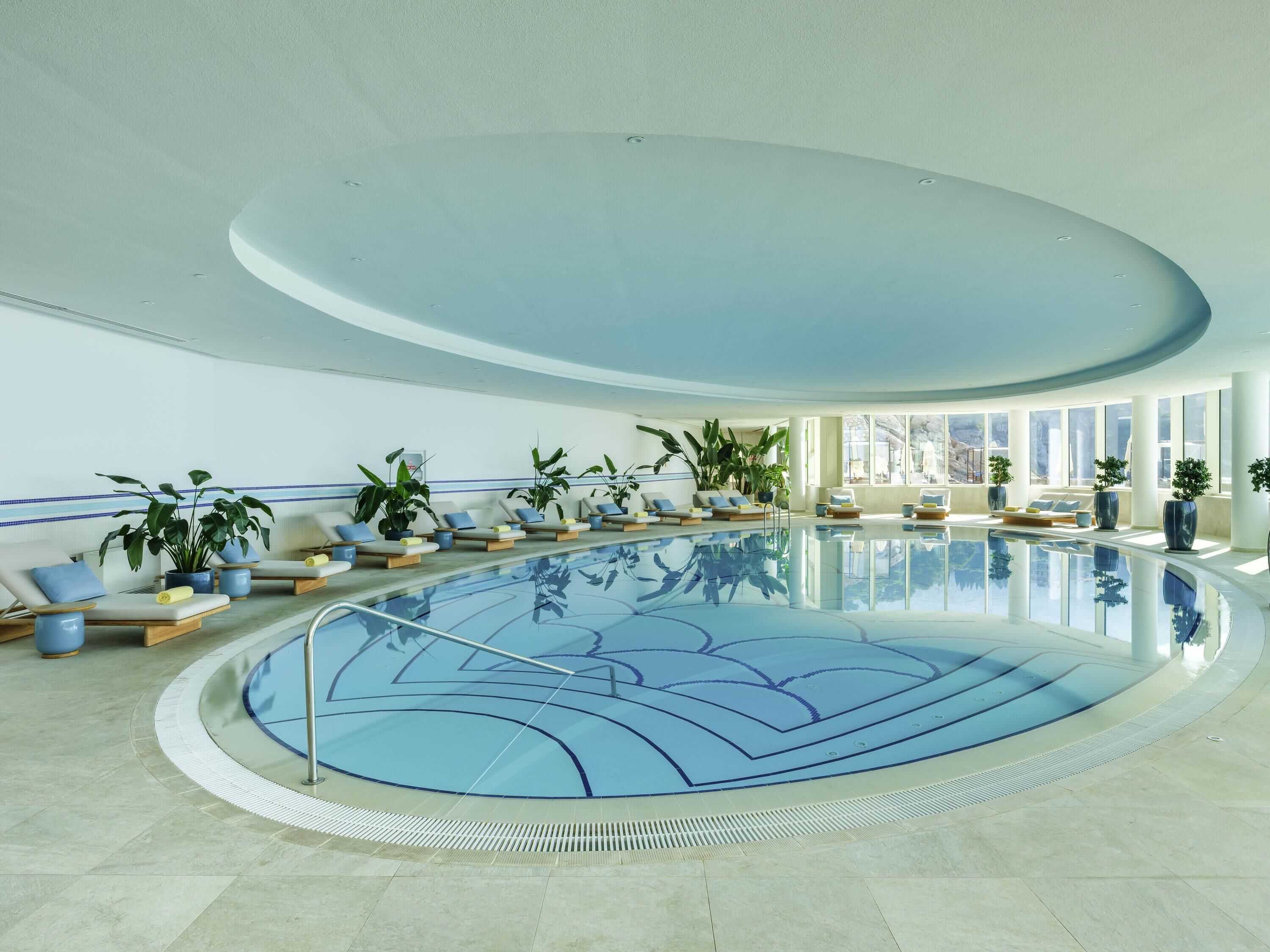Indoor pool, seasonal outdoor pool, free pool cabanas, pool umbrellas
