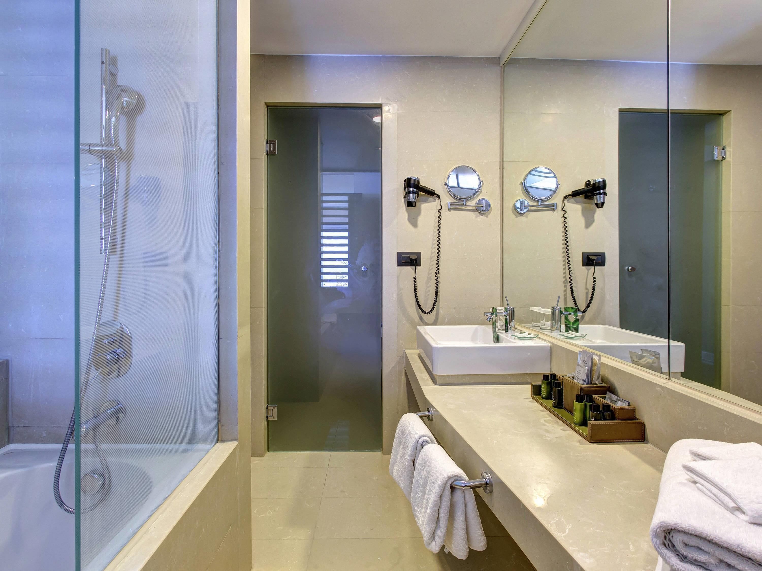 Premium bedding, down comforters, memory foam beds, minibar