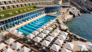 On the beach, sun-loungers, beach umbrellas