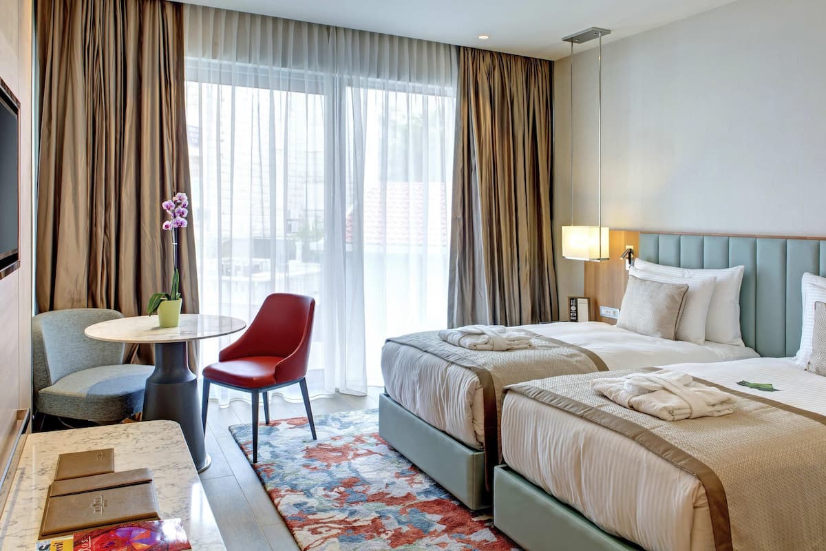 Premium bedding, down duvets, memory-foam beds, minibar