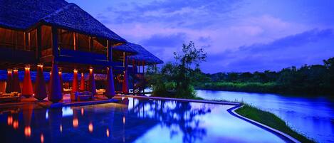 Outdoor pool, open 7:00 AM to 7:00 PM, pool umbrellas, sun loungers