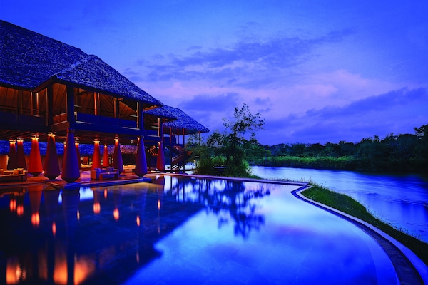 Outdoor pool, open 7:00 AM to 7:00 PM, pool umbrellas, sun loungers